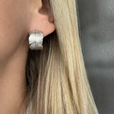 Feather hoop earrings large model in silver