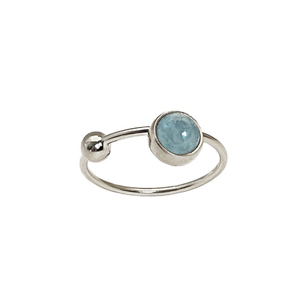 Koulè ring with aquamarine and bullet