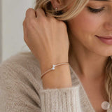 Silver bangle with zirconia
