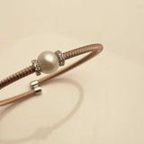 Silver bangle with zirconia and pearl