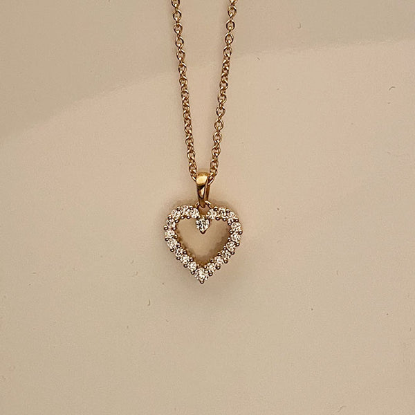 Heart pendant in 18K gold with diamonds