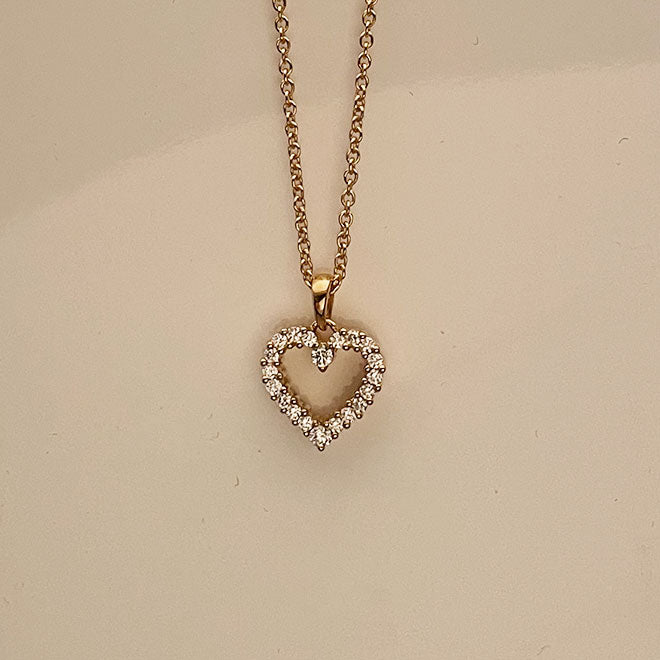 Heart pendant in 18K gold with diamonds