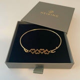 Bangle with hearts top