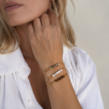 Multi armring i silver med Tigeröga topp