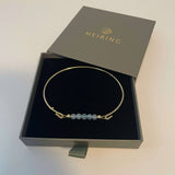 Armring med akvamarin og mini shell charm