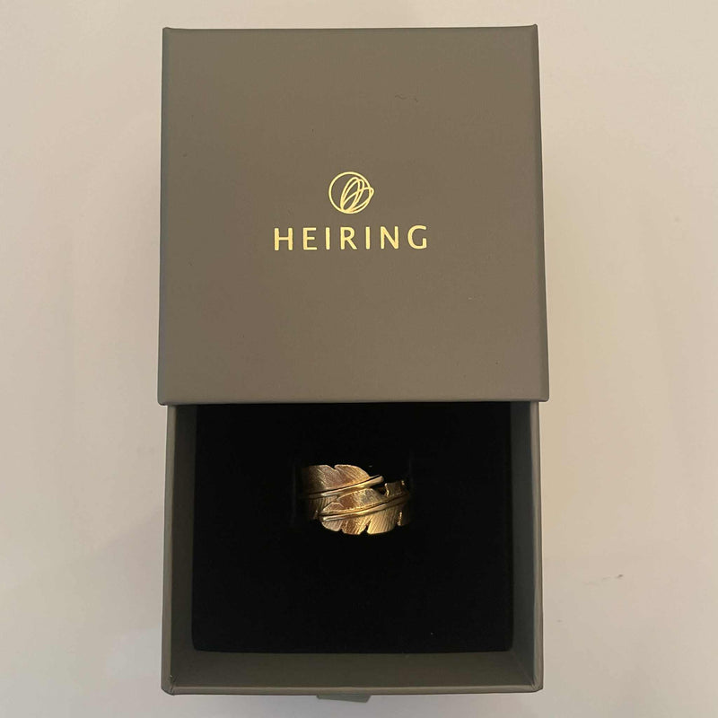Fjer ring mellem