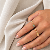 Koulè ring with peach moonstone and bullet