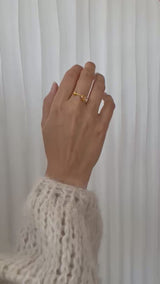 Koulè ring with peach moonstone and bullet
