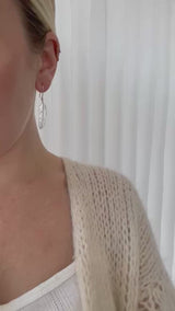 Earhook with medium feather