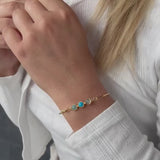 Bangle with turquoise Koulè top